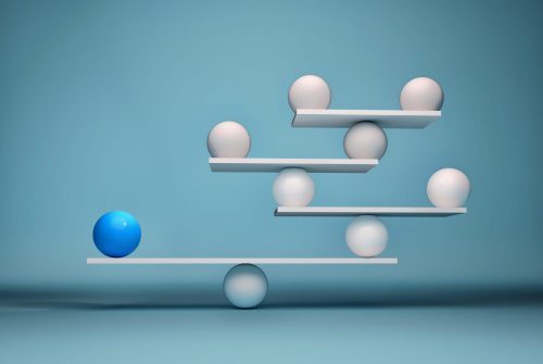 Leadership balancing the team - sfere in balance. This is a 3d render illustration